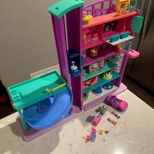 Polly Pocket Pollyville Mega Mall Playset with Doll & Accessories